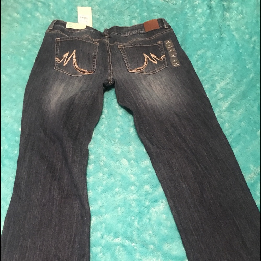 Maurice’s boot cut jeans with faded color.